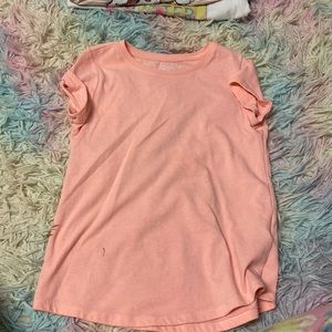 I am selling a pink 7/8 kids T-shirt short sleeve.